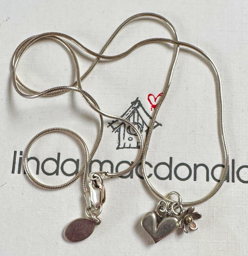 Signed designer linda - designer,